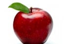 ripe red apple with green leaf isolated on white ripe red apple with green leaf isolated on white
